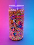 Glitter-filled acrylic snow globe cup with character graphics, purple lid, and straw