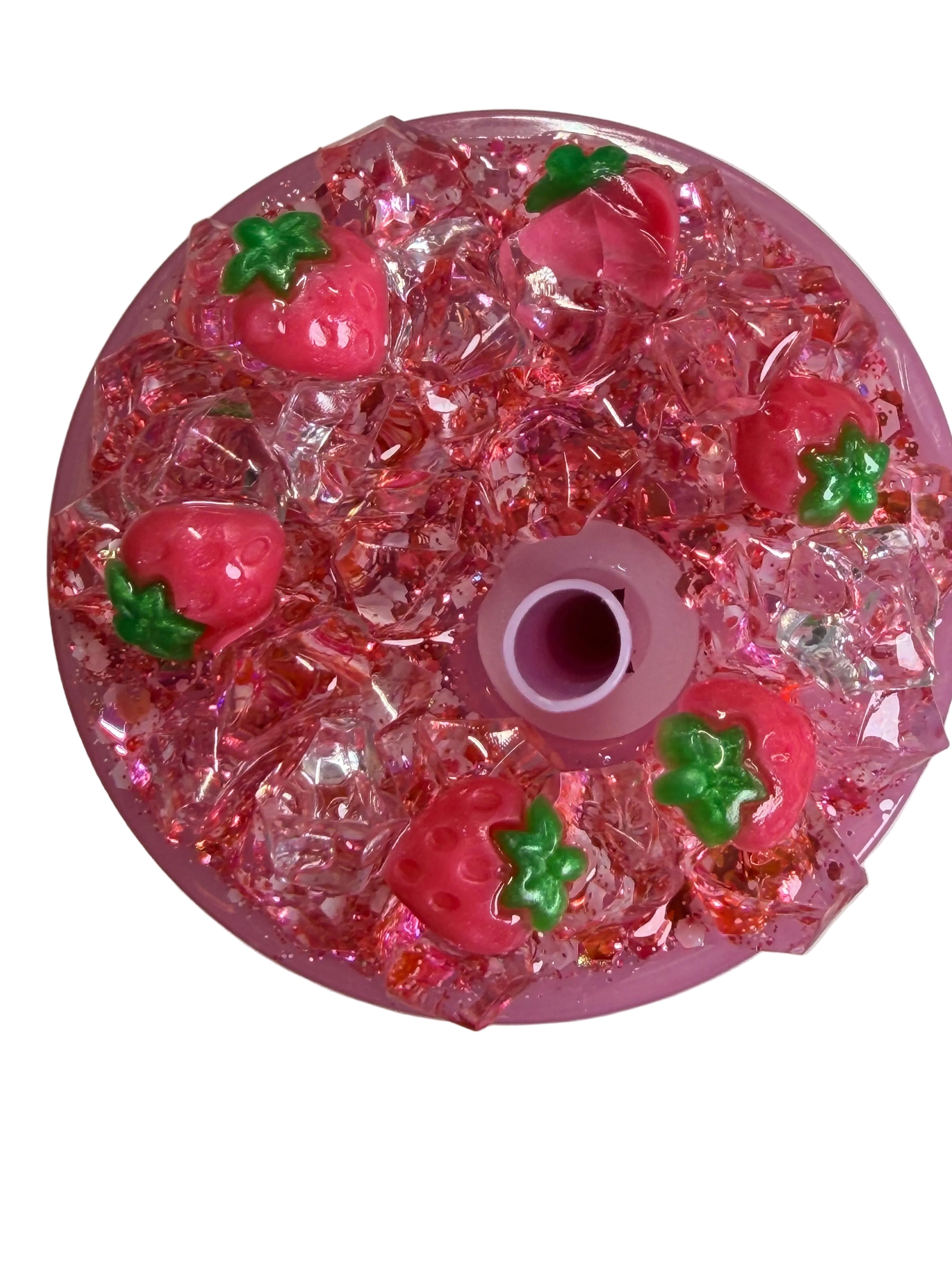 Glitter acrylic cup lid topper in pink with strawberry shapes and center hole