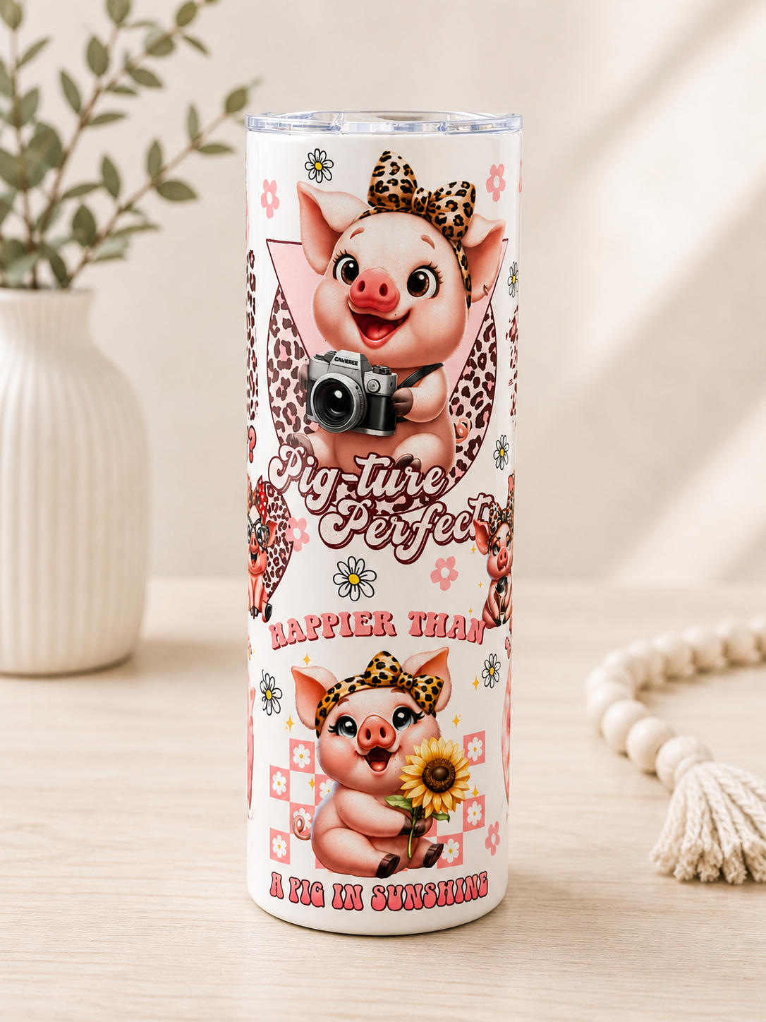 Pigs stainless steel cup with pig-with-camera graphic and flower accents