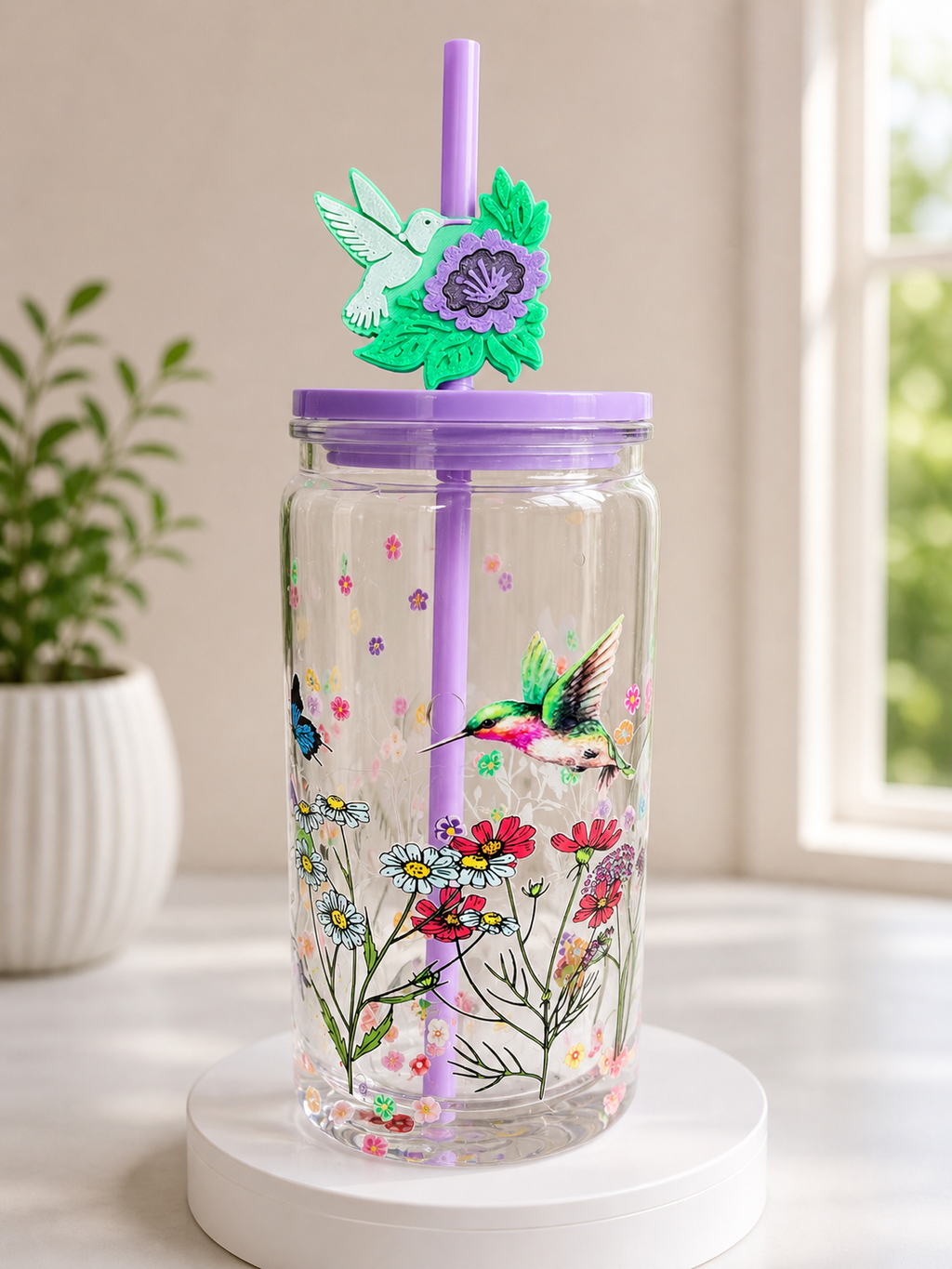 Acrylic snow globe tumbler with hummingbird, floral design, purple straw and lid