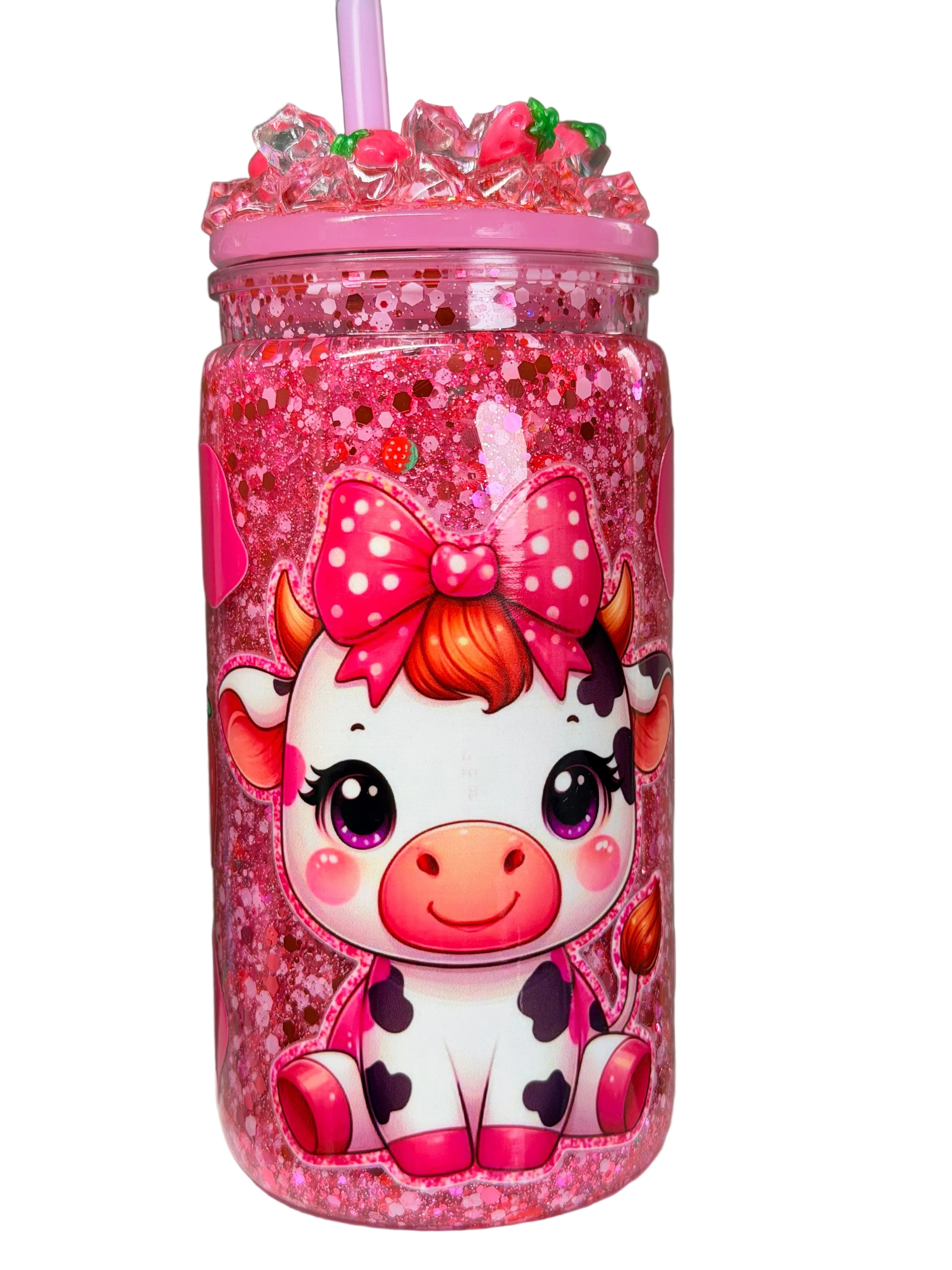 Pink glitter acrylic cup with cow strawberry graphic, ruffled lid and pink straw