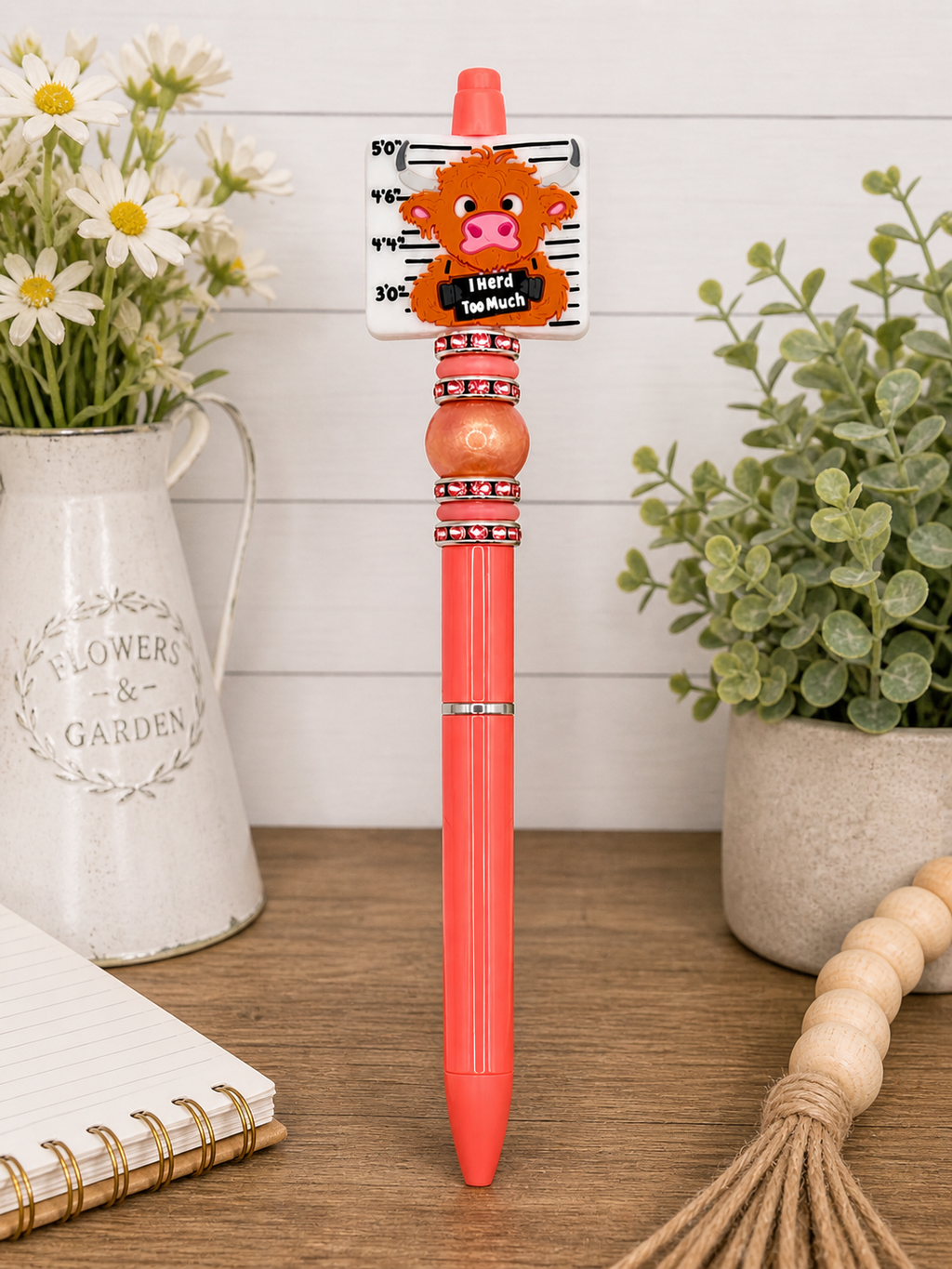 Red novelty pen with cartoon animal tag on top