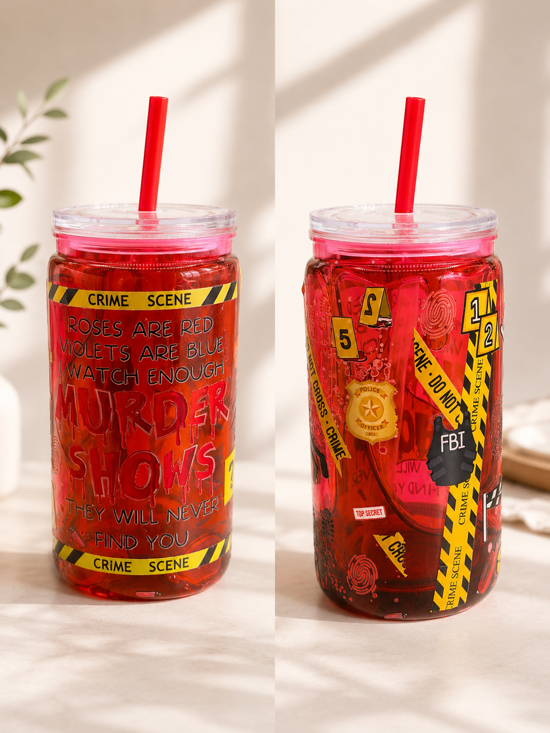 16 oz clear plastic tumbler cup with red straw and colorful crime-scene graphic print