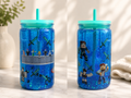 16 oz blue glitter drip cup with straw and character graphics on jar