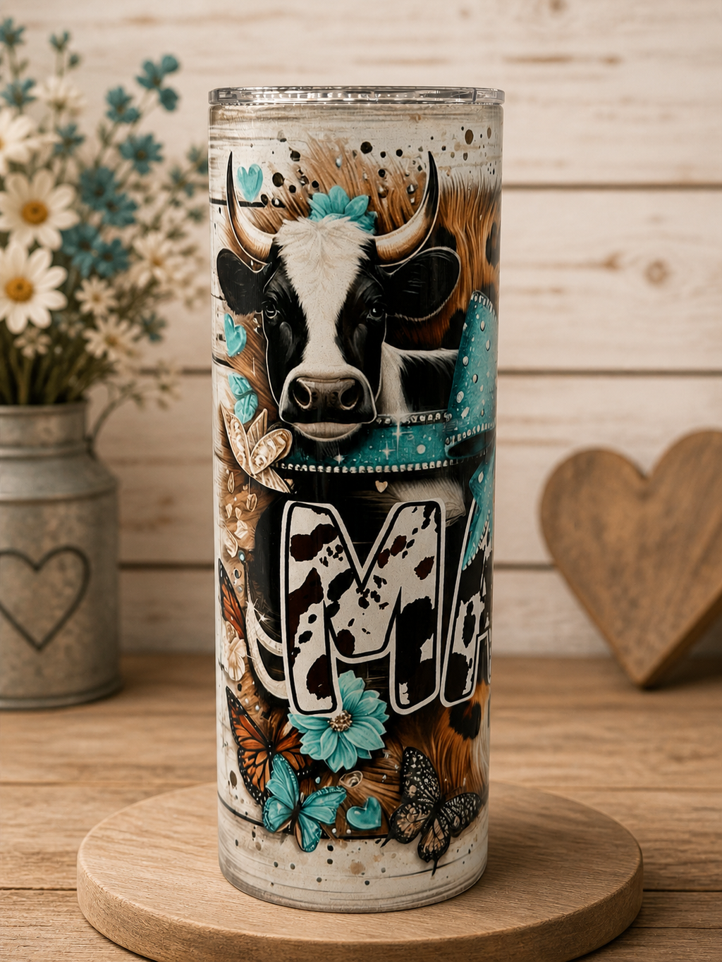 Stainless steel cup with colorful bull head and floral butterflies graphic, cylindrical