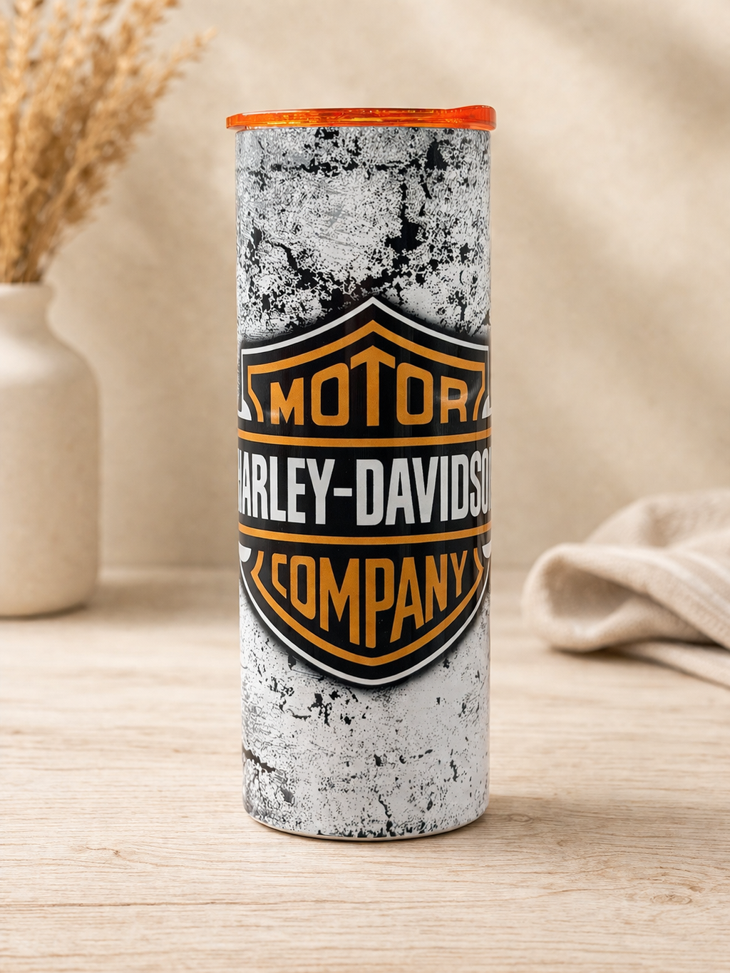 Harley Davidson stainless steel cup with orange lid, black-and-gold logo graphic