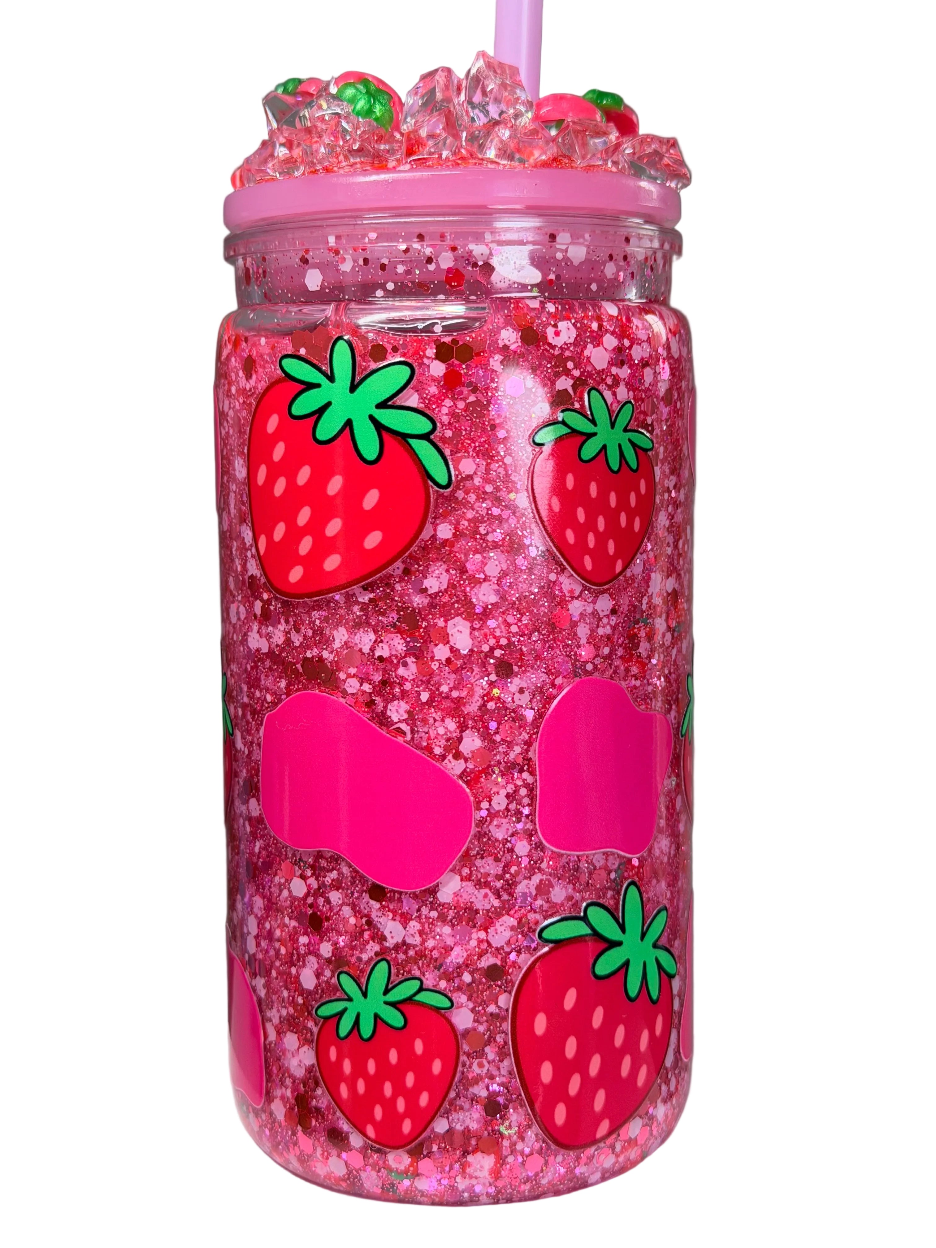 Pink glitter acrylic cup with strawberry face pattern, pink straw, decorative lid