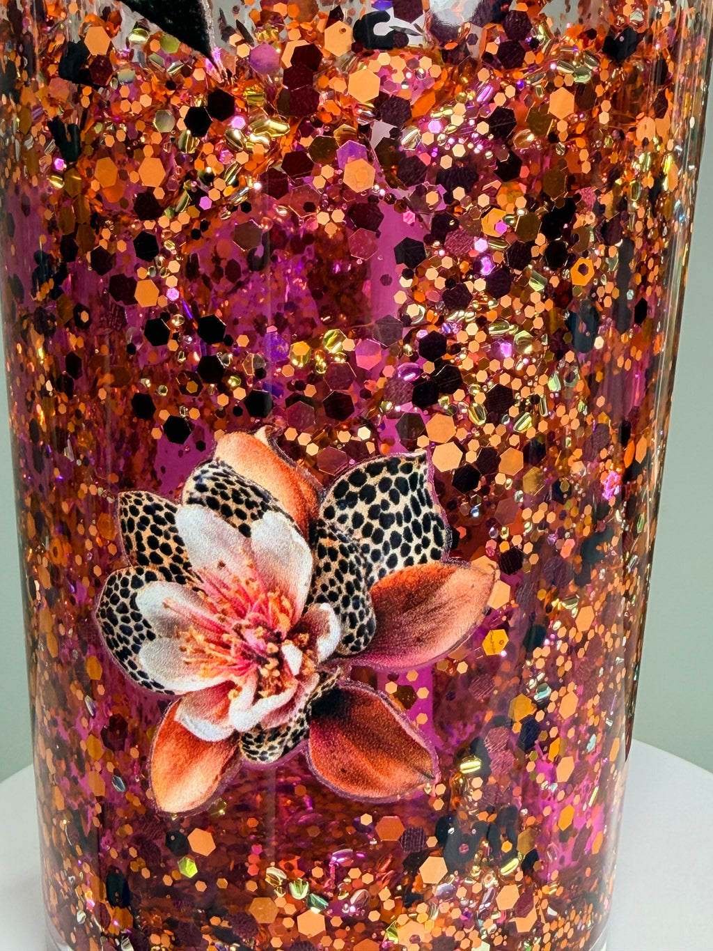Purple glitter tapered acrylic tumbler with floral cheetah print, clear lid and straw