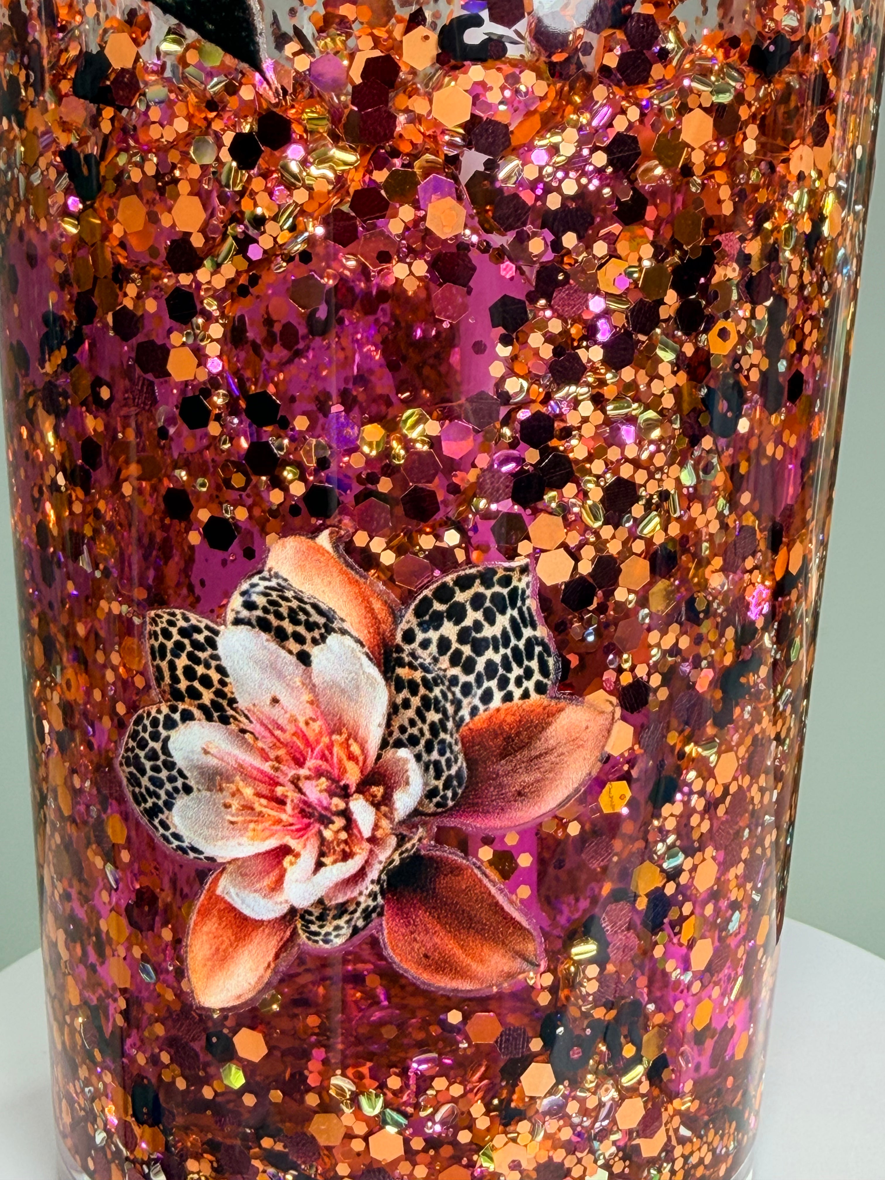 Purple glitter tapered acrylic tumbler with floral cheetah print, clear lid and straw
