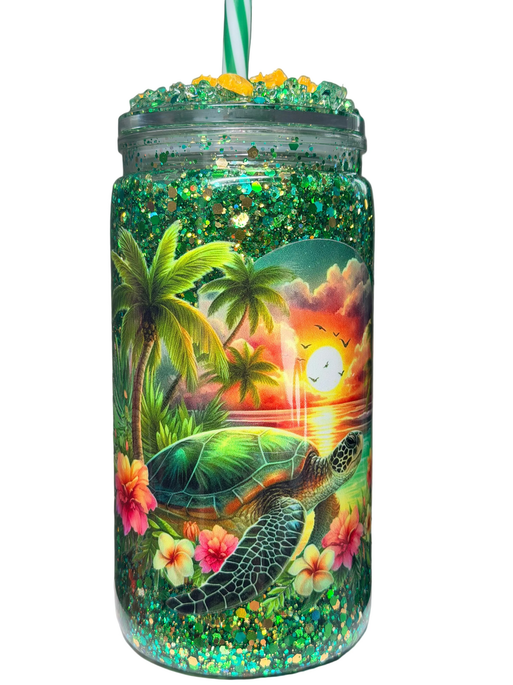 Glitter acrylic tumbler with green turtle scene, sunset, and flip lid with straw