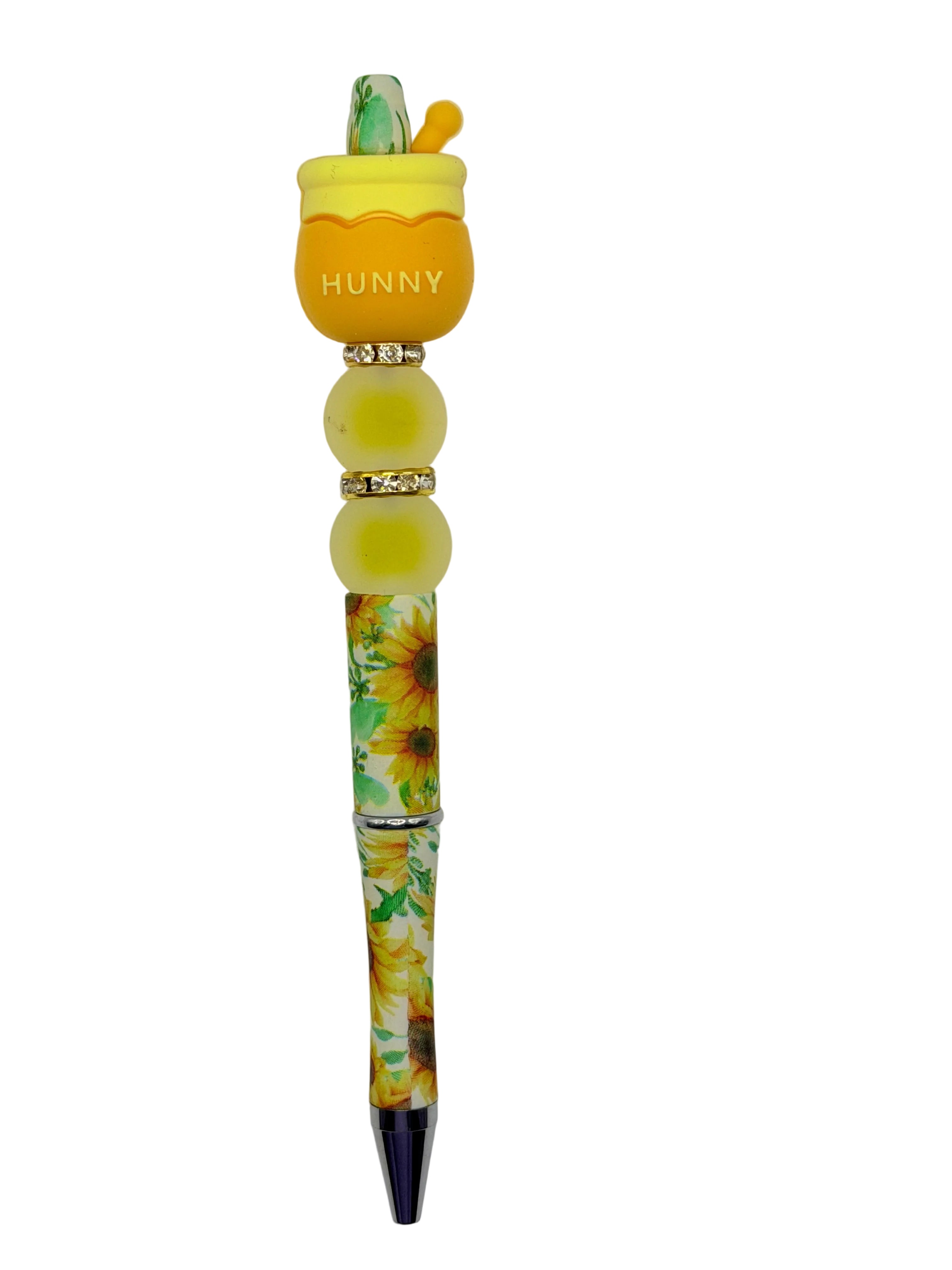 Honey pot pen, side view with yellow top and floral resin body