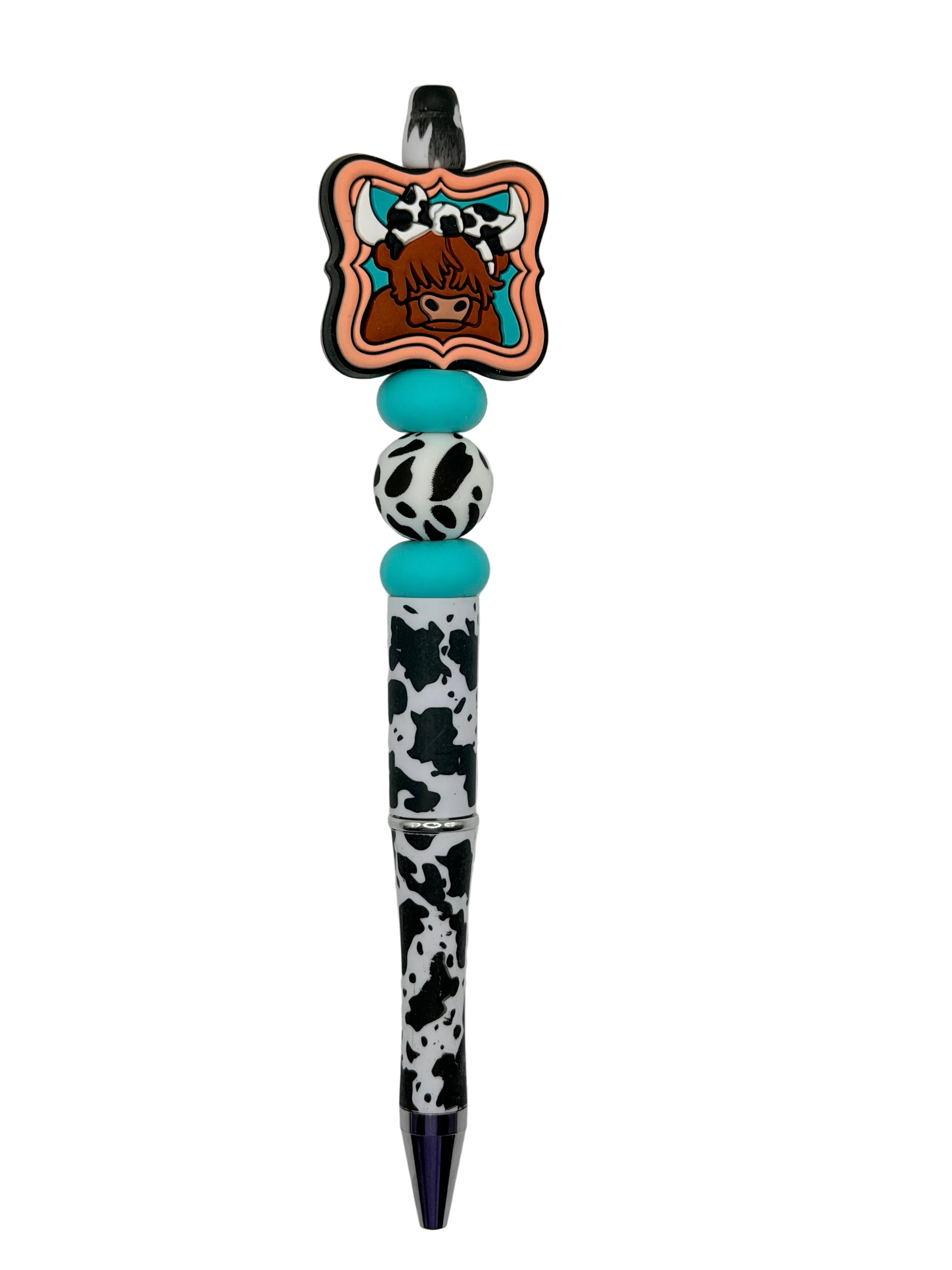 Cow-themed novelty pen with spotted barrel, teal beads, and bow charm