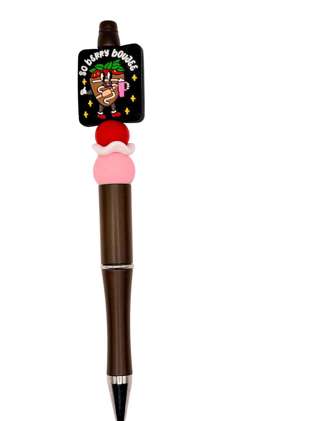 Brown ballpoint pen with black logo topper and pink bow-shaped charm.