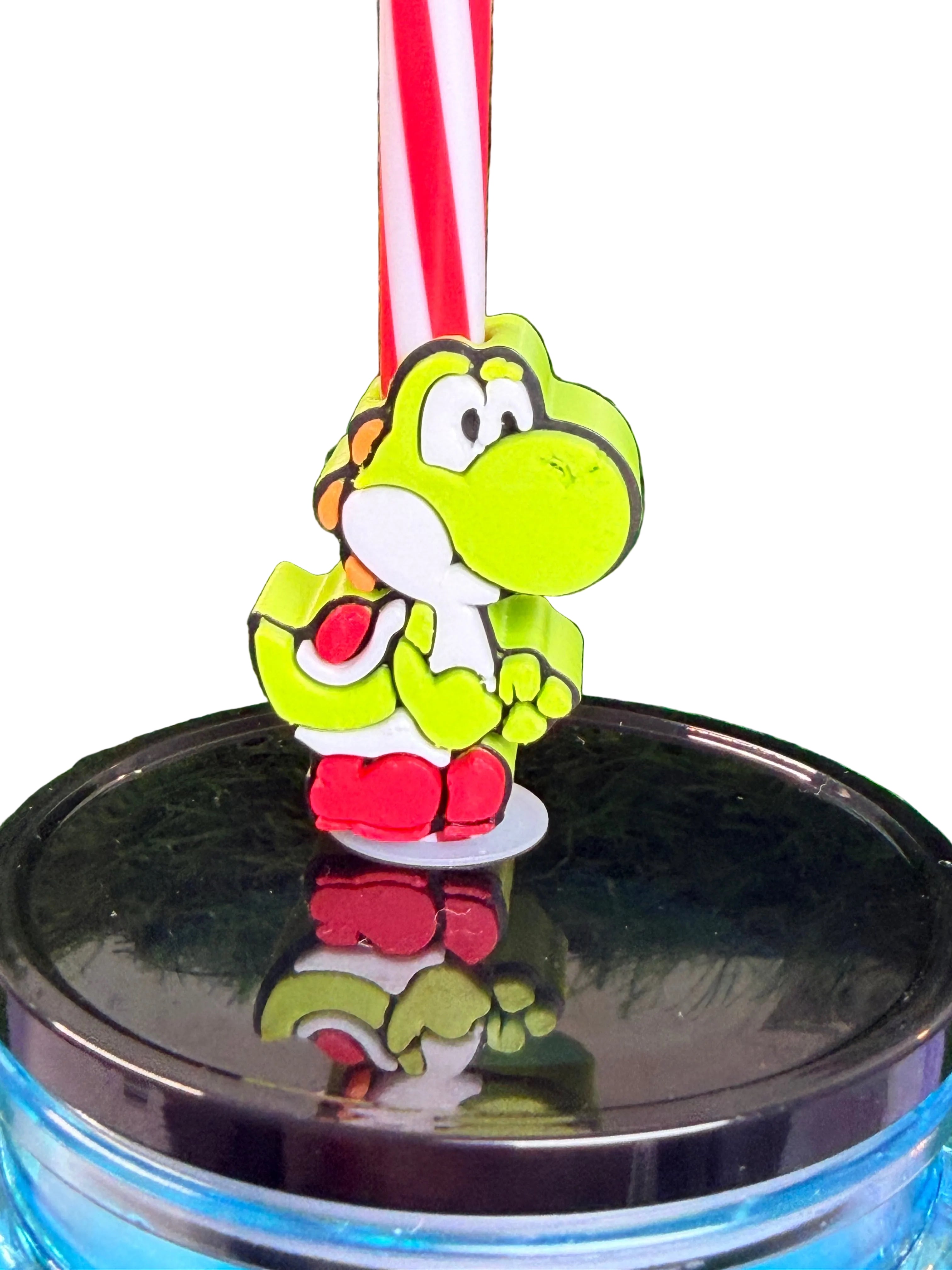 Clear-lidded acrylic drip cup with Yoshi topper and red-white straw