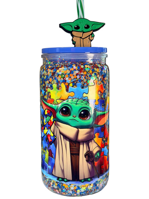 Acrylic snow globe tumbler with blue lid and green Yoda topper, colorful puzzle graphics