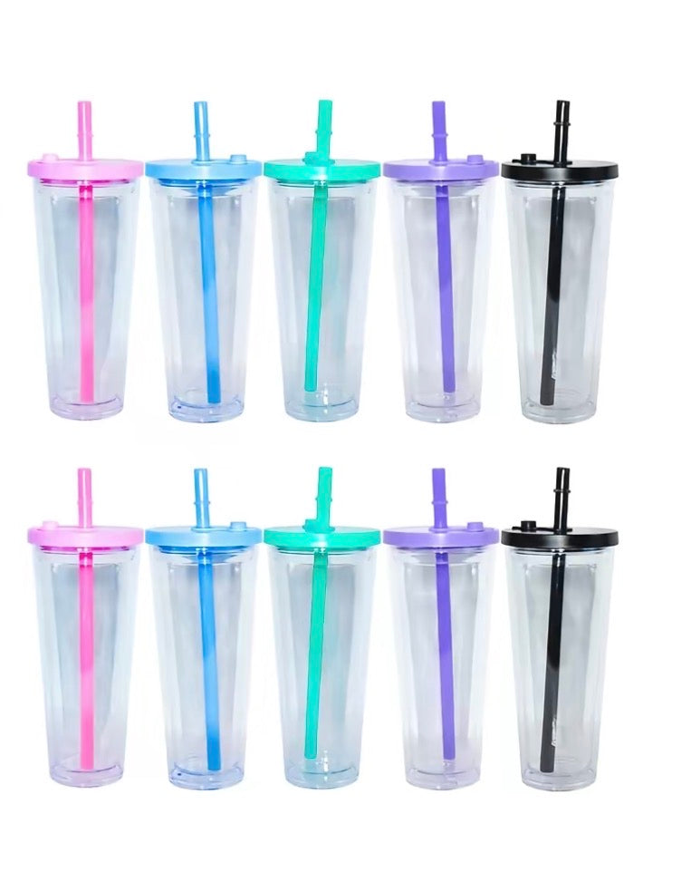 Set of clear tumblers with colored lids and matching straws